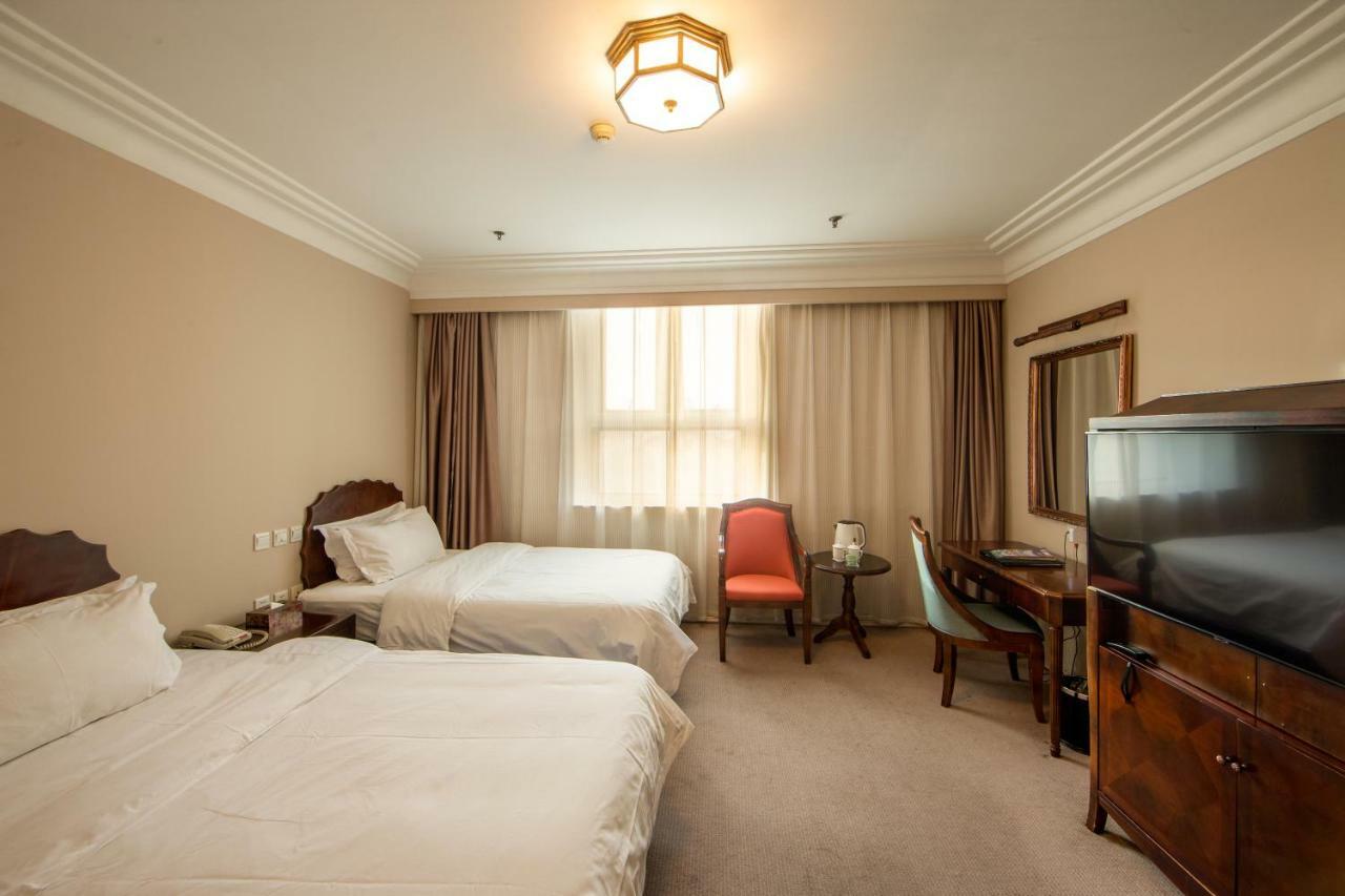 Harbin International Hotel Værelse billede